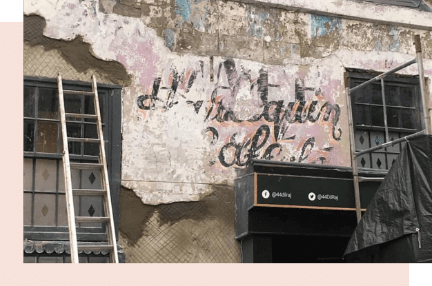 An outside image of the shop front revealing once a successful cafe name in the 70's "Harelequin Cafe"