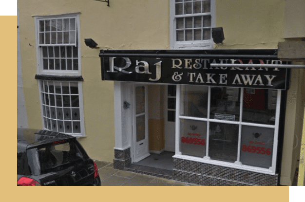 An outside image of the shop front taken in early 2010's. The shop name is Raj.