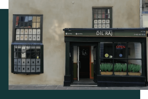 An outside image of the shop front taken in present time. The shop name is Dil Raj.